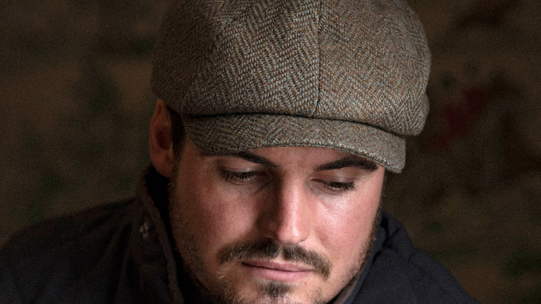 Man wearing a tweed cap