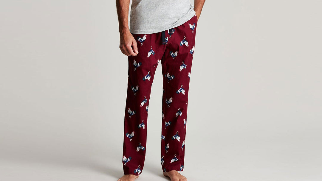 Man wearing Joules pyjama bottoms