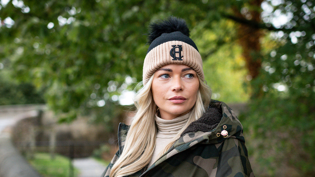 Woman wearing a Holland Cooper hat