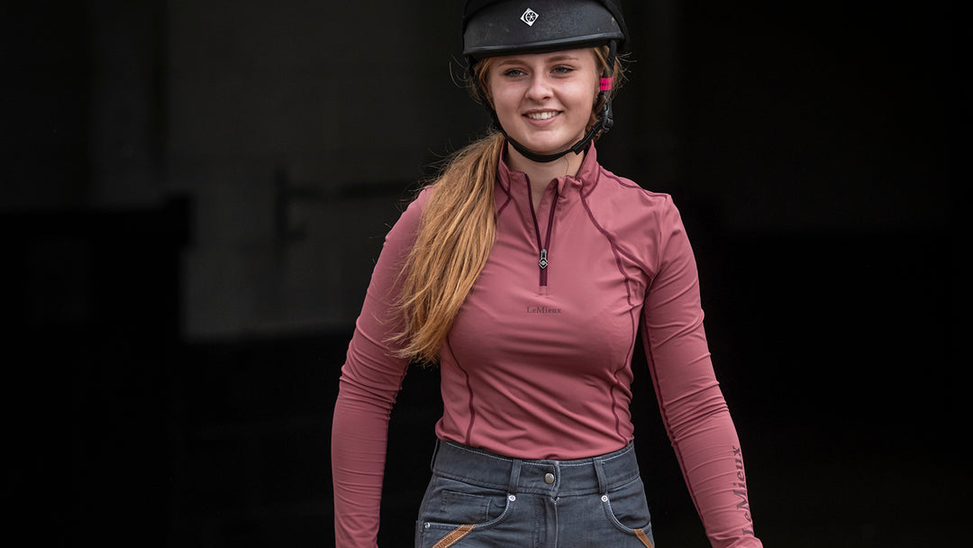 Woman wearing a LeMieux baselayer