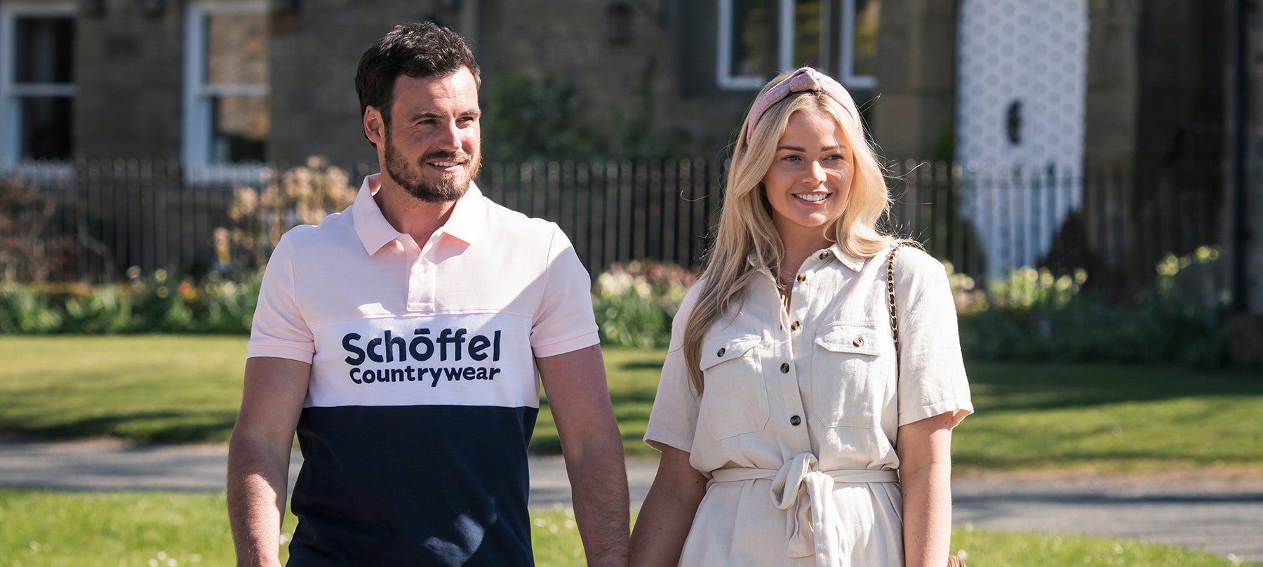 Man and woman wearing new season clothing