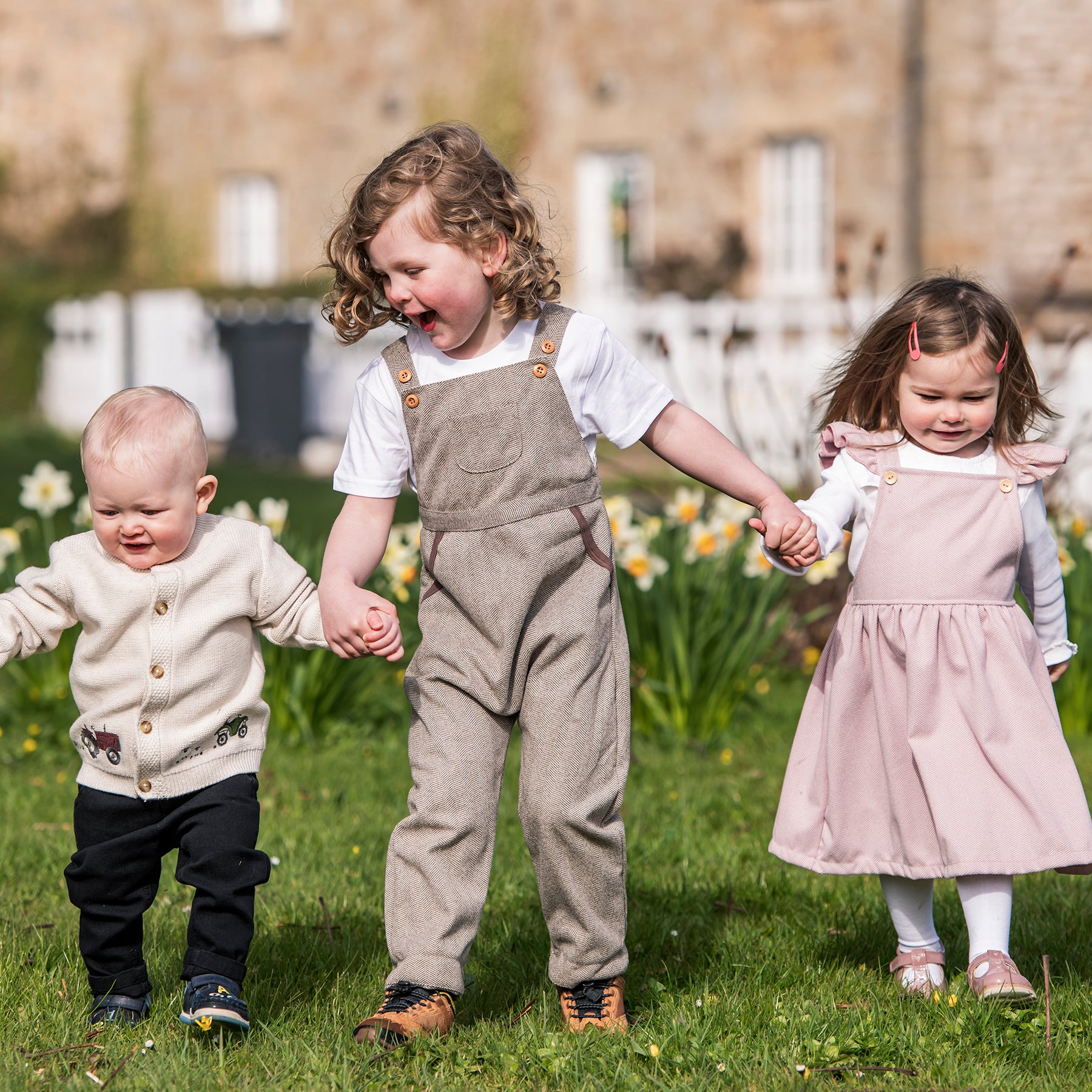 Three kids in The Little Stamford Clothing