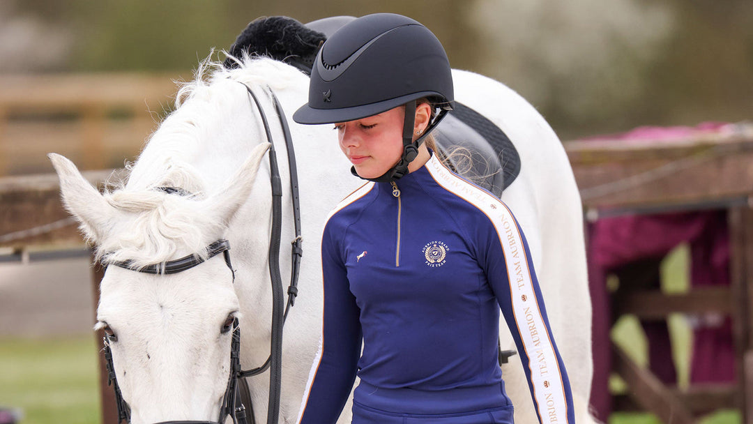 Girl wearing an Aubrion baselayer