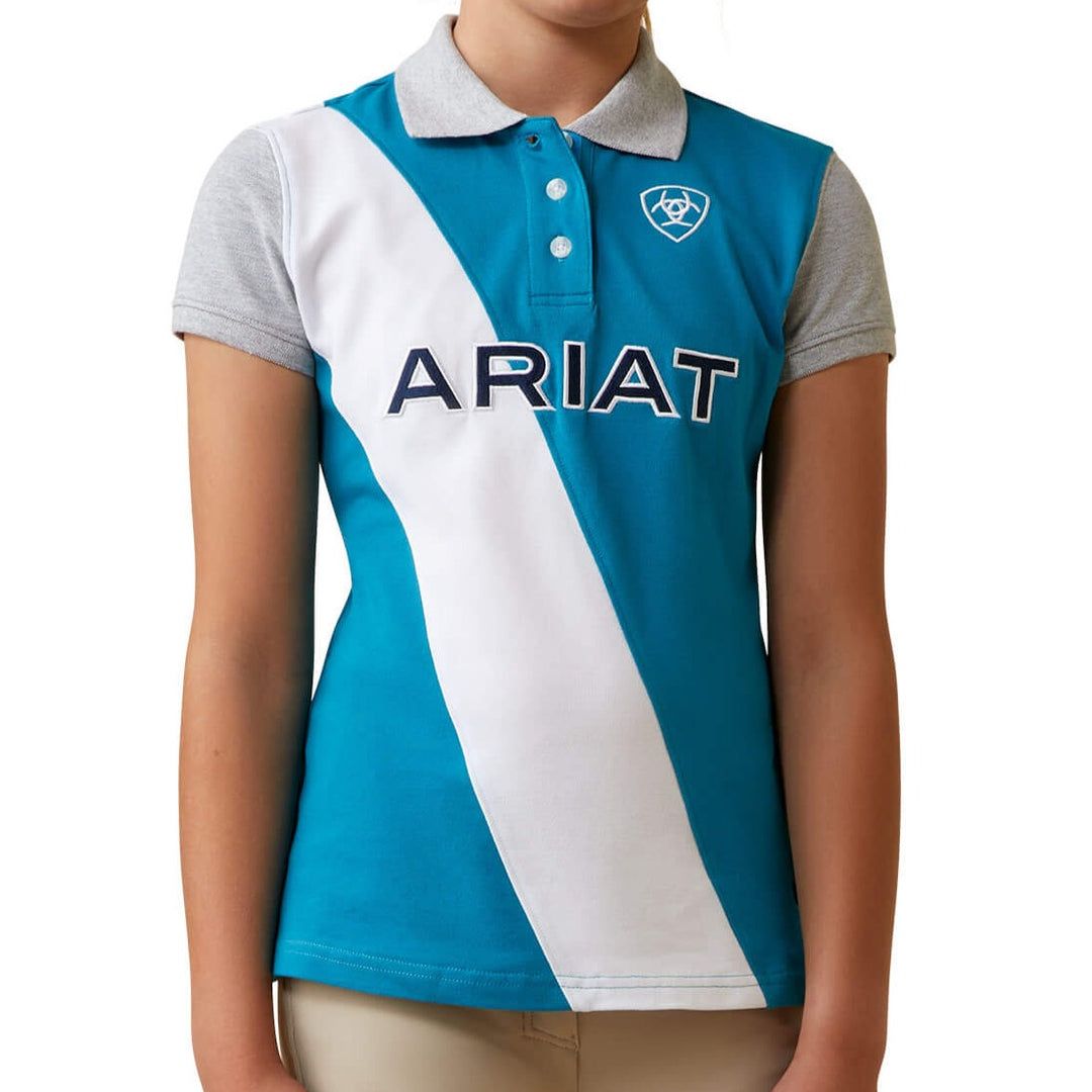 The Ariat Youth Taryn Button SS Polo in Light Blue#Light Blue