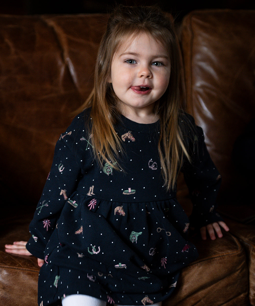 Girl wearing Joules dress