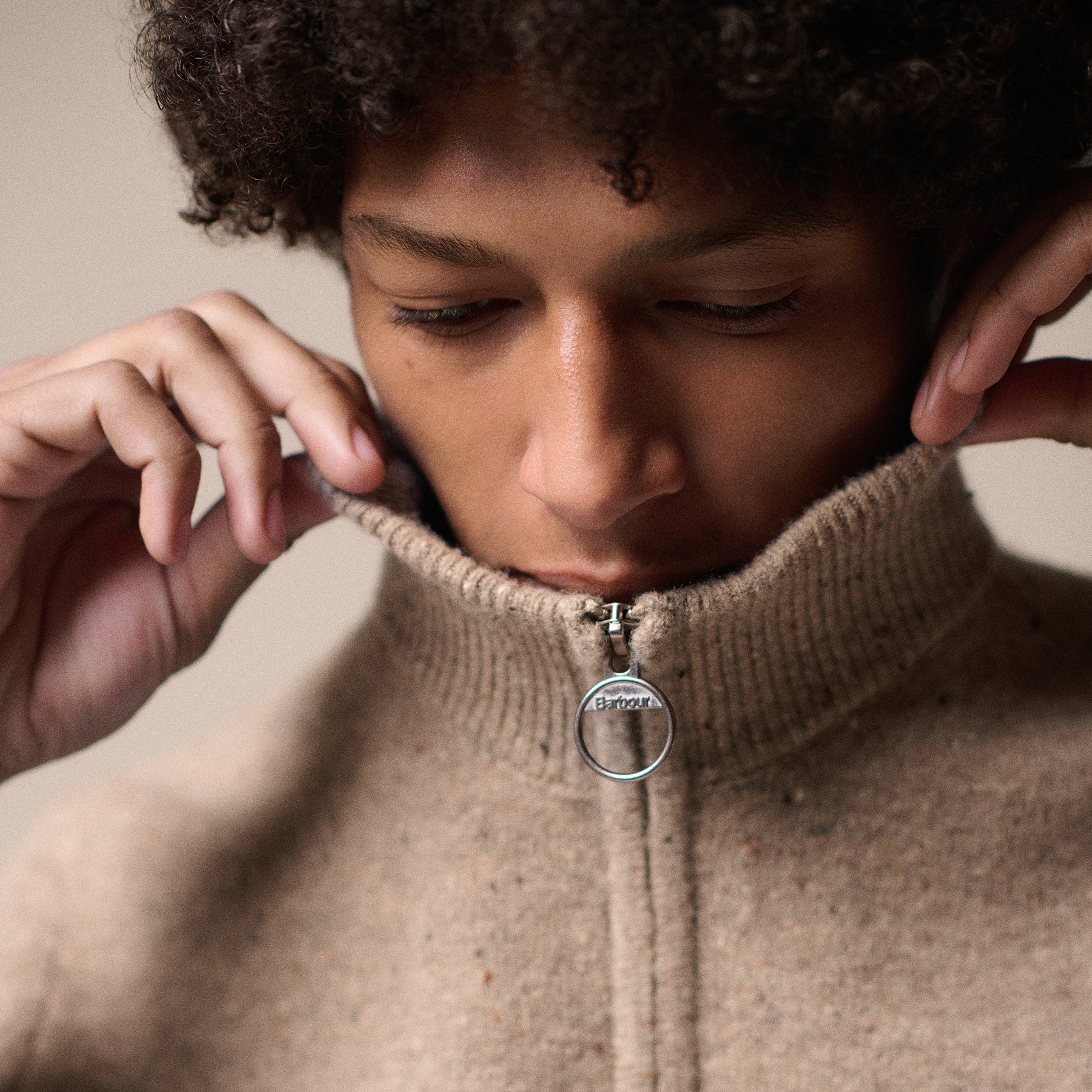 Man wearing the Barbour Tainsbury Jumper