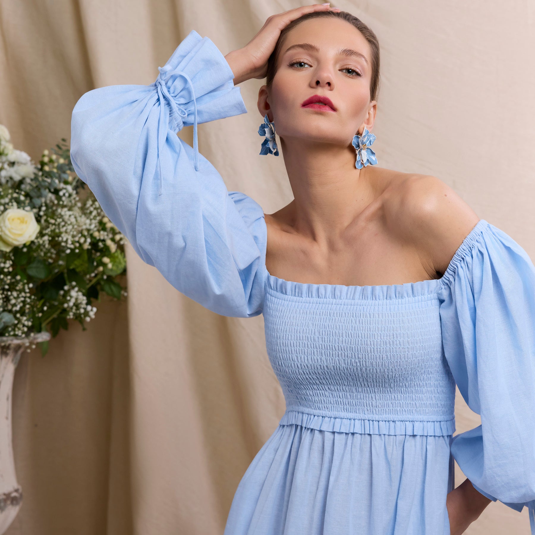 Woman in Holland Cooper smock dress