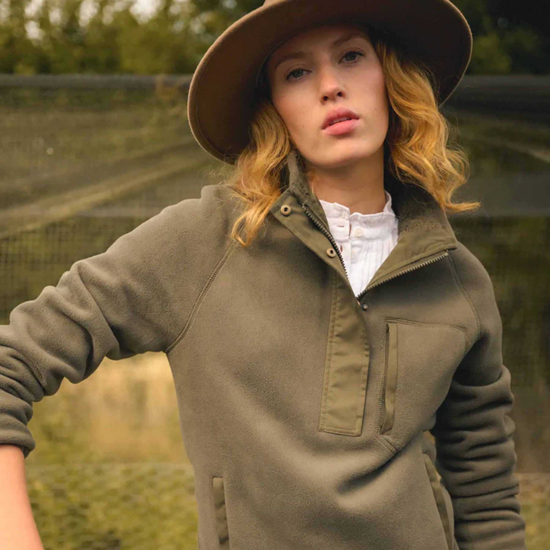 Woman wearing Fairfax & Favor The Aria Quarter Zip Fleece