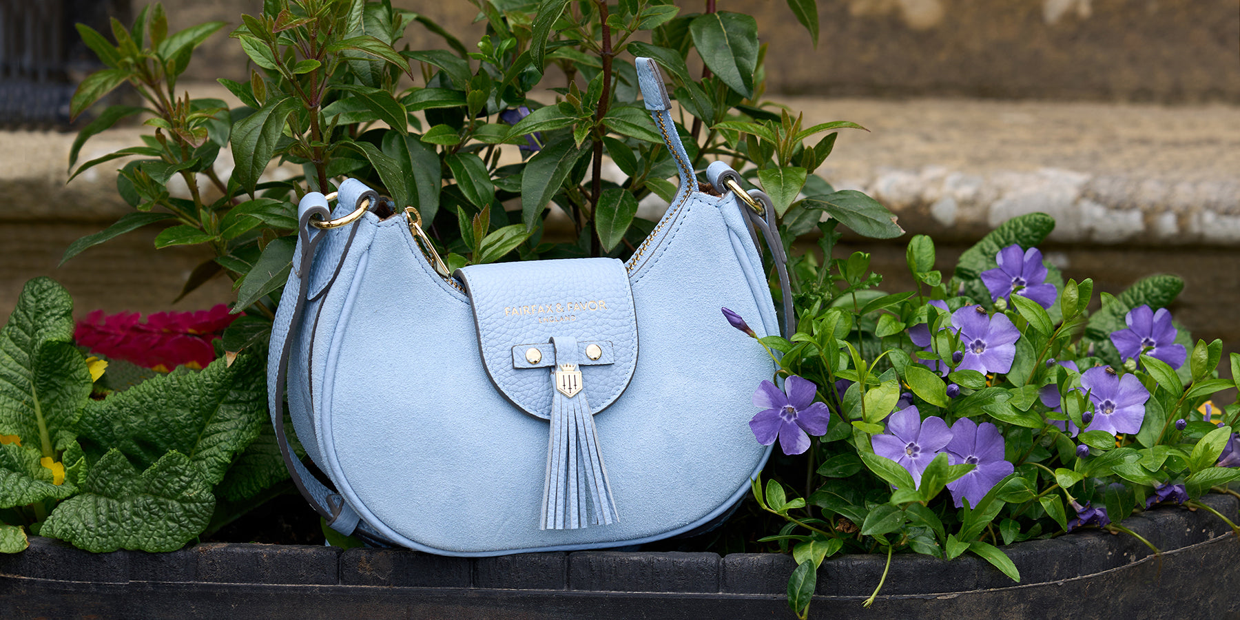 New Sky Blue Fairfax & Favor bag on a planter