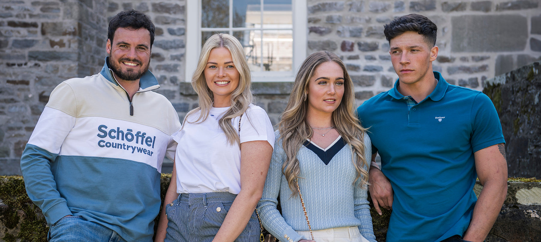 Men and women wearing new season clothing