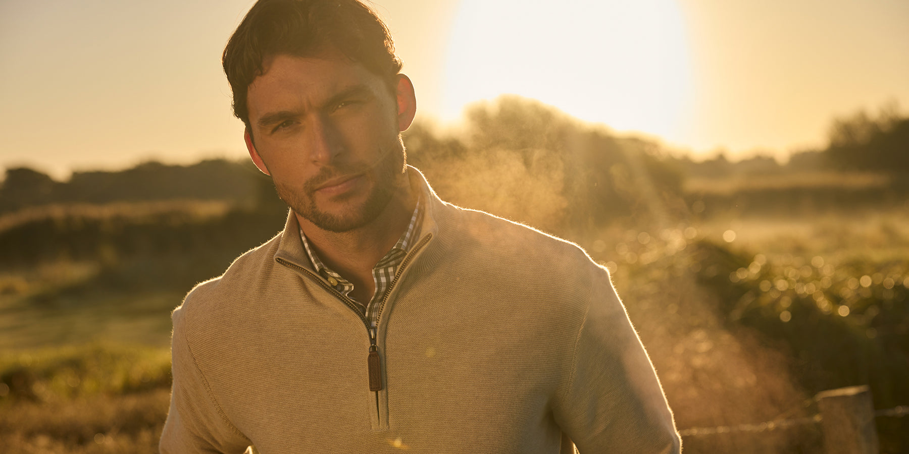 Man in a field wearing a new Schoffel jumper