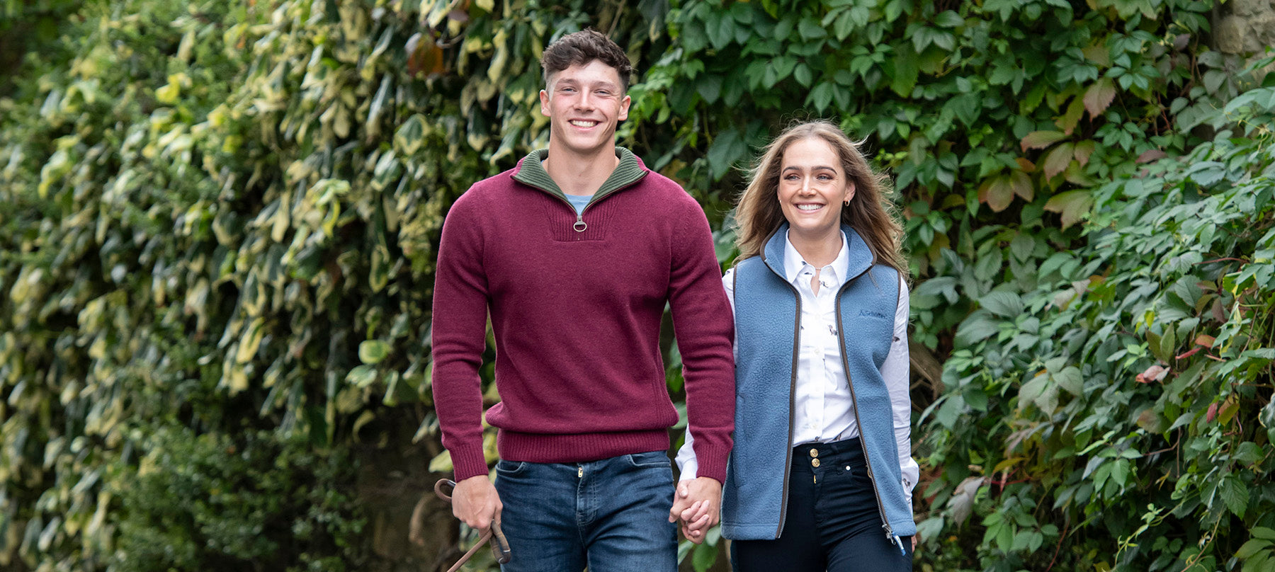 Man and woman in Schoffel clothing walking 