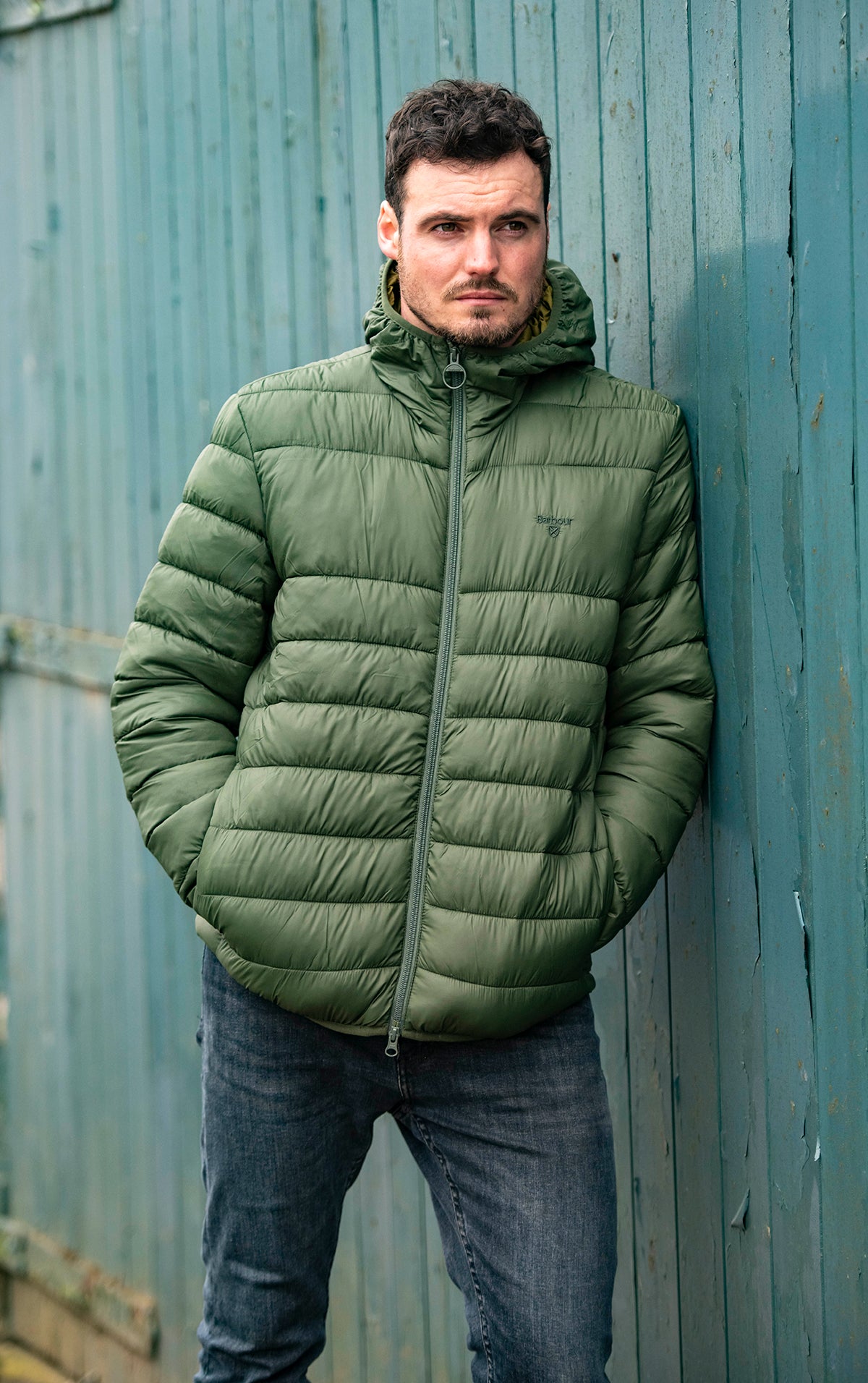 Man wearing a green padded Barbour Jacket