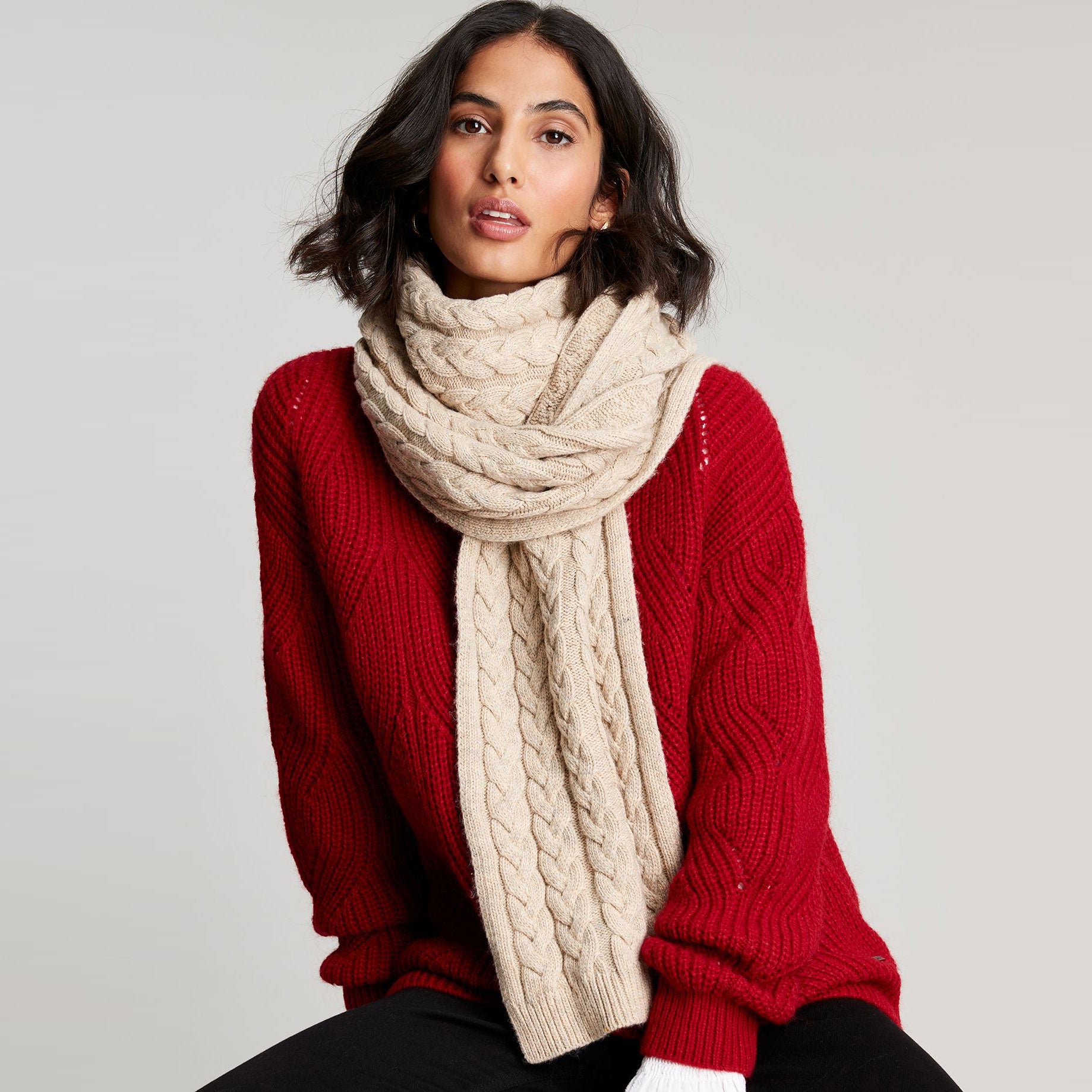 Red cable knit store scarf